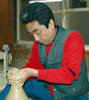 熊谷　光修さん(54歳)